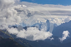 Dramatic scenery in the Dolomite Alps, Italy, in summer, with storm clouds and majestic peaks