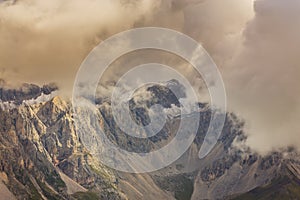 Dramatic scenery in the Dolomite Alps, Italy, in summer, with storm clouds and majestic peaks