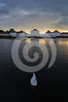 Dramatic scenery of post storm sunset of Nymphenburg palace in Munich Germany.