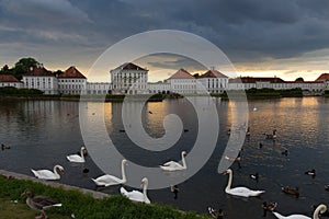 Dramatic scenery of post storm sunset of Nymphenburg palace in Munich Germany.