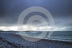 Dramatic sky above Cemlyn Bay, Anglesey in north Wales