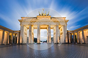 Dramatic sky with Brandenburg gate in Berlin city, Germany