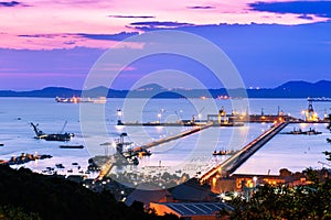 Dramatic Sky burst over Sriracha harbor port Chonburi Thailand, long exposure technic