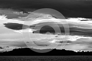 Dramatic sky at dusk over Trasimeno lake Umbria, Italy, with moody clouds