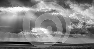 Dramatic sky over coastline, Cornwall