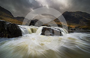 Dramatic sky over river Etive in Scotland