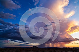 Dramatic sky with storm clouds at sunset