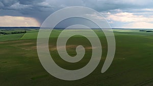 Dramatic Sky Before Rain With Rain Clouds On Horizon Above Rural Landscape Field Meadow.