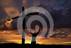 Dramatic sky scenery with a worshiper photo