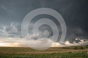 Rotating clouds of a supercell thunderstorm over the plains of northwestern Oklahoma photo