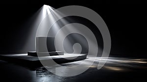 Dramatic Spotlight on Mysterious Black Cube on Stage