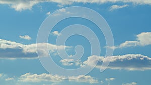 Dramatic spring cloudscape. Blue sky white clouds. Changing cloudscape.