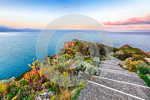 Dramatic spring sunrise on the the cape Milazzo panorama of nature reserve Piscina di Vener