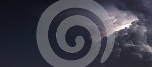 Dramatic Storm Clouds background. Lightning in the clouds.