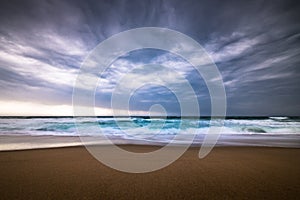 Dramatic storm clouds on a rainy day over the ocean at a beach