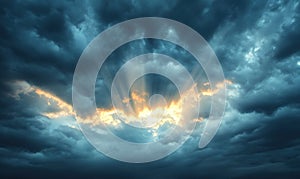 Dramatic stormy sky with sun rays breaking through dark clouds