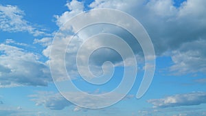 Dramatic Summer cloudscape. Blue sky white clouds. Changing cloudscape. Time lapse.