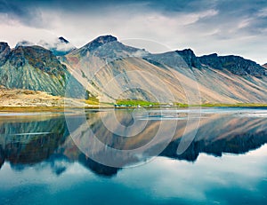 Dramatic summer morning on the Stokksnes headland on the southeastern Icelandic coast. Picturesque outdoor scene with Vestrahorn