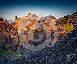 Dramatic summer view of famous Eastern Orthodox monasteries listed as a World Heritage site, built on top of rock pillars.