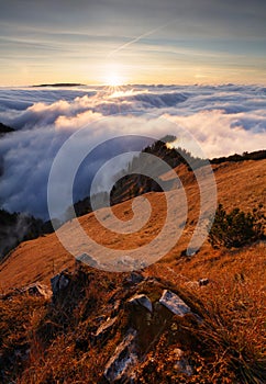 Dramatic sunrise in mountains with fog and sun - landscape  Slovakia