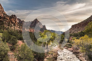 dramatic sunrise in Watchman and Virgin river landscape taken in Zion national Park in Utah during autumn.