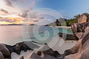 Dramatic sunset at Anse Source d`Argent beach, La Digue island, Seychelles