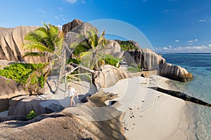 Dramatic sunset at Anse Source d`Argent beach, La Digue island, Seychelles photo