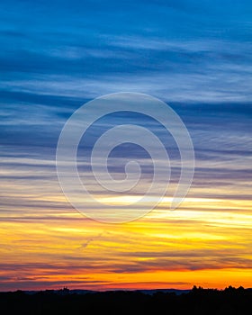 Dramatic sunset with beautiful clouds and atmospheric colour gradient over Frankfurt