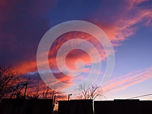 Dramatic Sunset Clouds Crossing Over A Fence Silhouette In The New Jersey Evening Sky