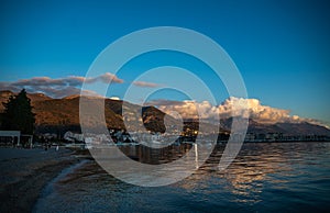 Dramatic sunset clouds over Tivat mountains on Adriatic coast, Montenegro