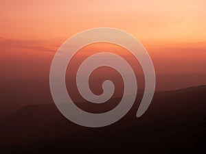 Dramatic sunset gradient shade mountain landscape of Phu Kradueng National park. Thailand. Warm tone image