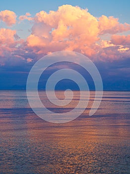 Dramatic Sunset Light on Clouds and Sea water, Greece