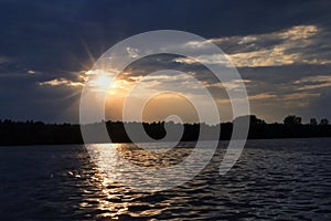 Dramatic sunset over Danube River Romania