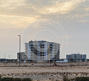 Dramatic sunset over an empty road. City