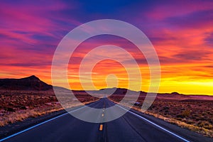 Dramatic sunset over an empty road in Utah