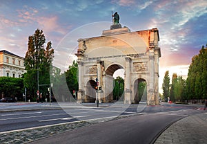 Dramatic sunset over Siegestor - Victory Gate arch in downtown Munich, Germany