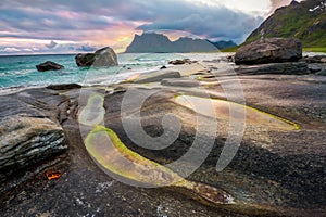 Dramatic sunset over Uttakleiv beach on Lofoten islands in Norwa