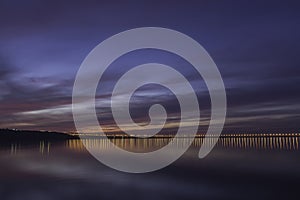 Dramatic sunset over Volga River and Presidental Bridge, located in Ulyanovsk