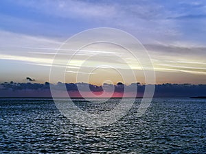 Dramatic sunset over the water on Cuban beach