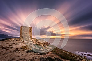 Dramatic sunset at Punta Spanu on the coast of Corsica