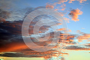 Dramatic sunset sky with clouds. Blurry colorful sky background. Blue sky and colorful clouds pattern backgrounds. Sunrise sky. photo