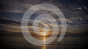 Dramatic Thundercloud Over Ocean at Sunset