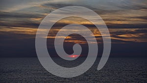 Dramatic Thundercloud Over Ocean at Sunset
