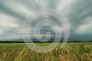 Dramatic thunderstorm with arcus cloud