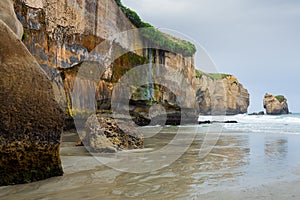 Dramatic Tunnel Beach carved into the cliffs, Dunedin, New Zealand