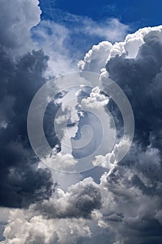 Dramatic vertical sky background with dark and bright clouds for roll up banner or Clp billboards