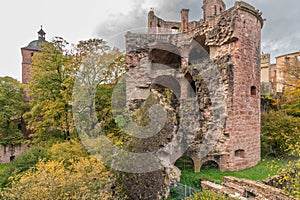 Dramatic view on the expoded tower or herb tower from the famous Heidelberg castle. Tower used to store gunpowder.