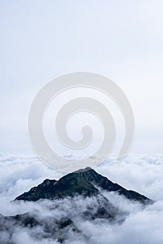 Dramatic view of Kiso Mountains engulfed in sea of clouds