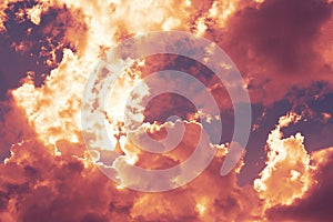 Dramatic view of a red clouds in the sunset sky