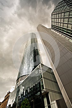 Dramatic view of skyscrapers before the rain